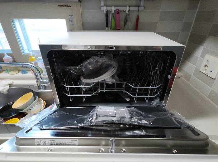 경기 평택시 정수기 연결 설치 - 상판 위에 식세기 배치